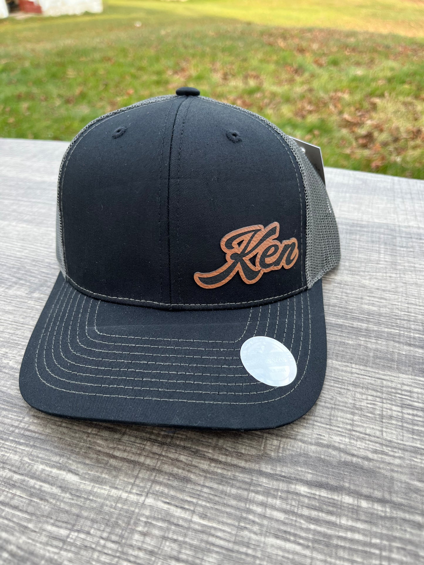 Personalized trucker hat leather patch in black / gray