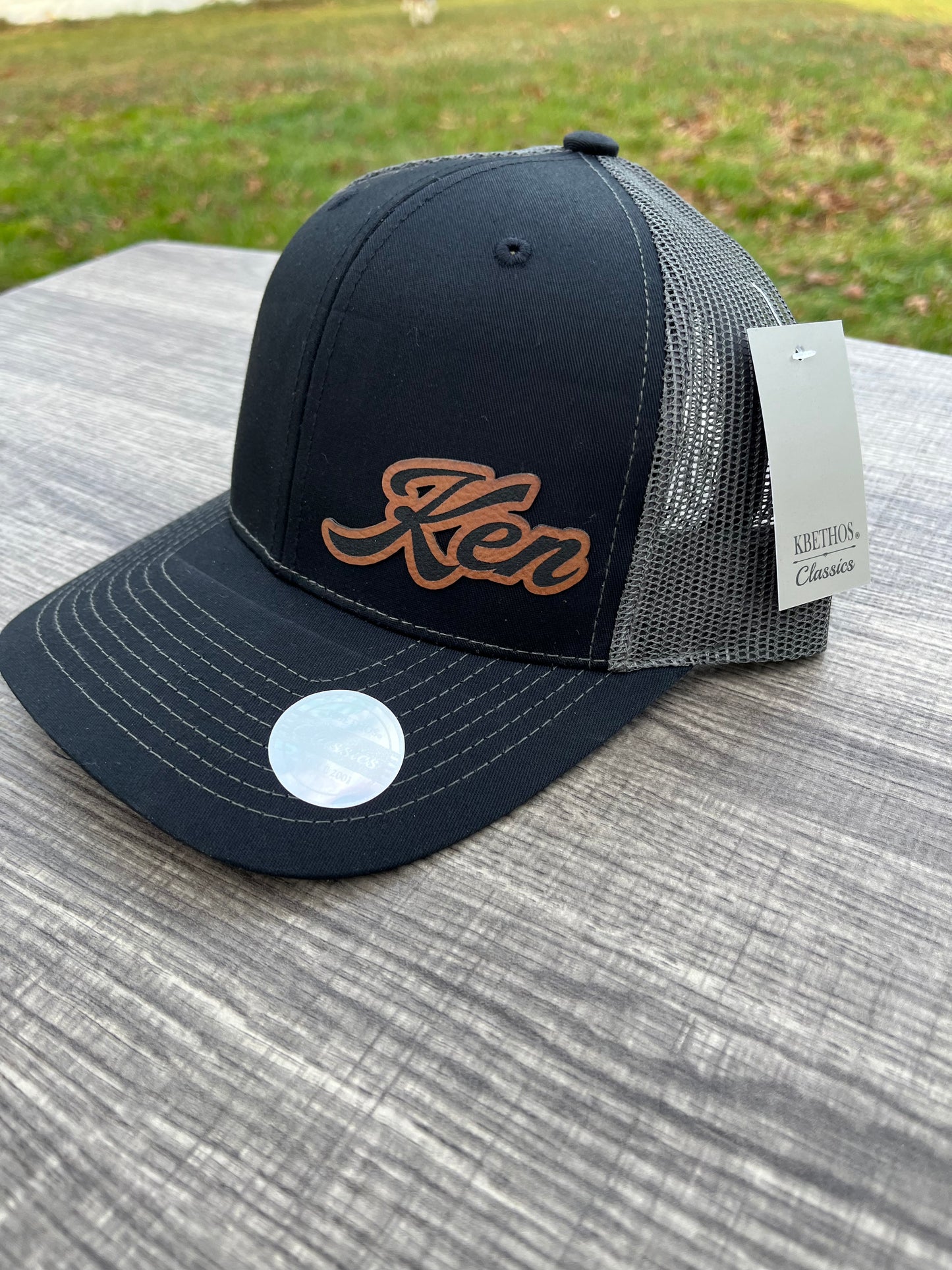 Personalized trucker hat leather patch in black / gray