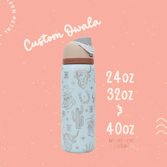 Blue water bottle with western design on a pink background, featuring 'Custom Owala' branding.