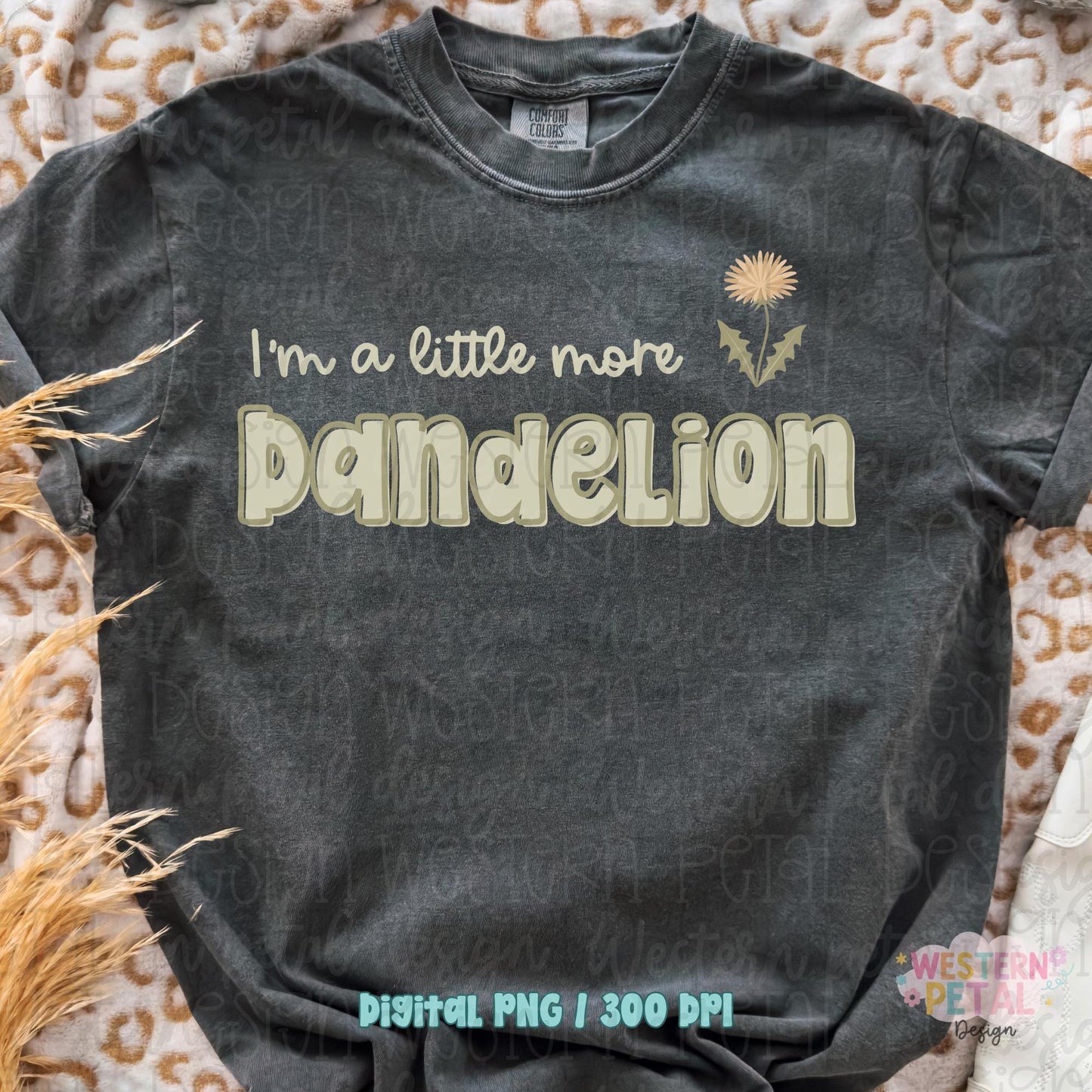 Retro floral dandelion shirt PNG design with the phrase “I’m a little more dandelion” in neutral beige tones on a dark shirt mockup.