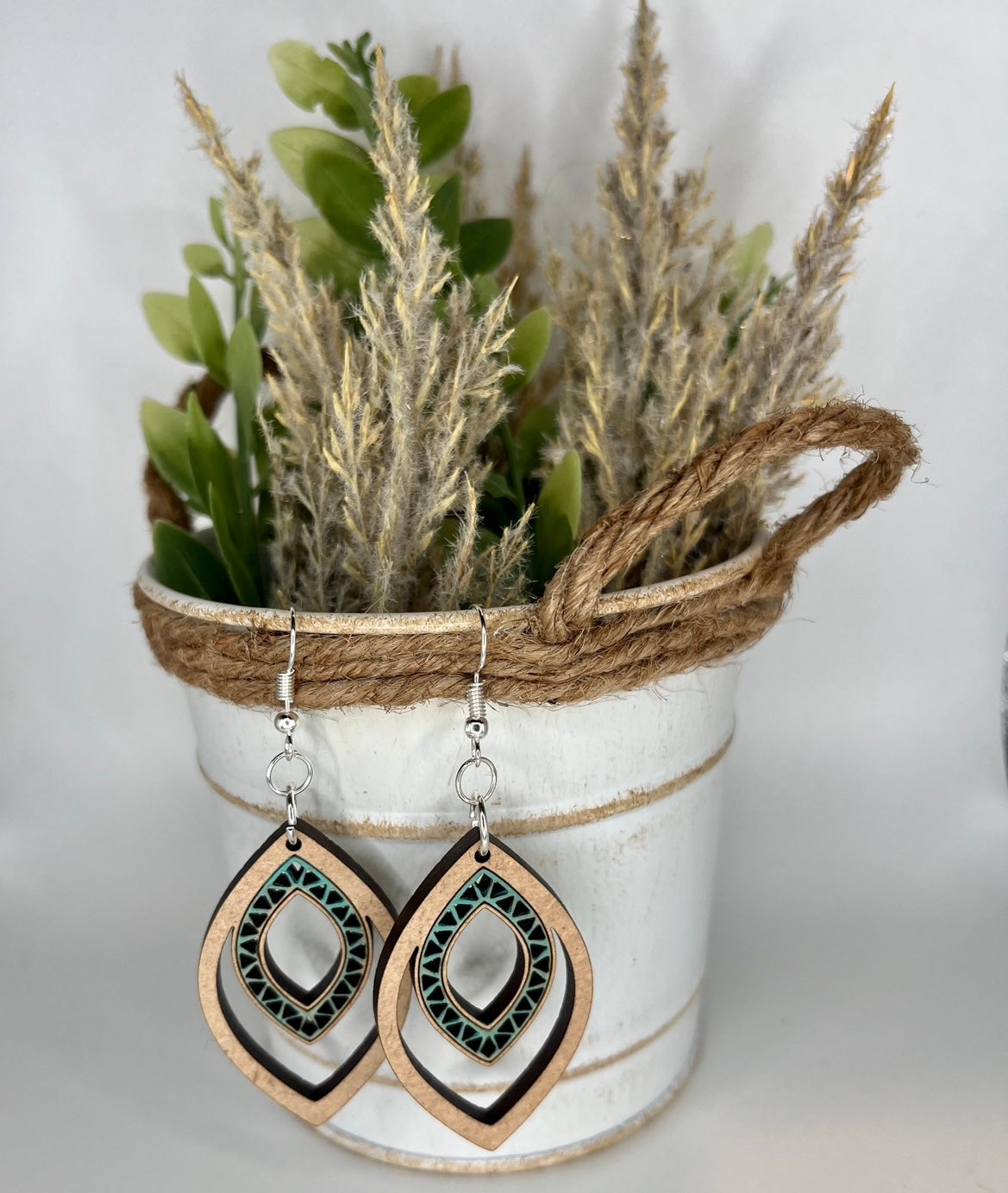 Western style teal teardrop cutout earrings handpainted